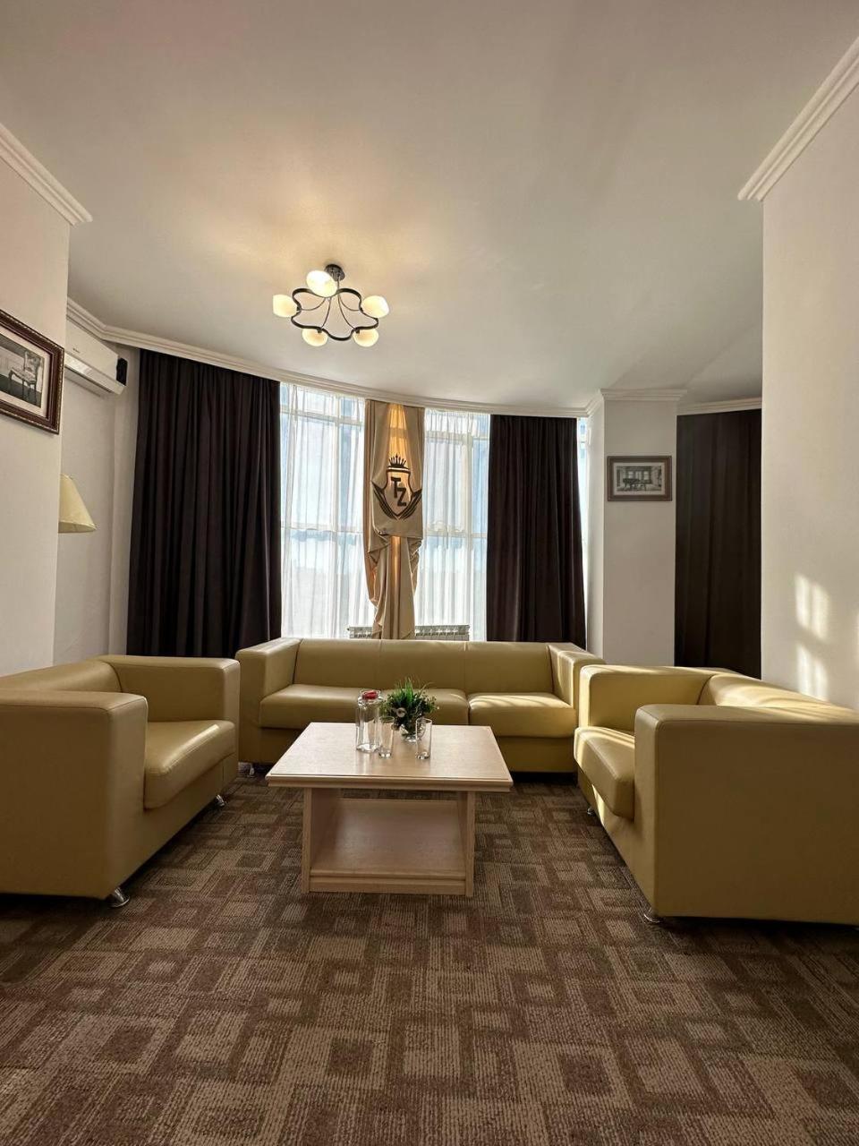 Tanzharyk Hotel アクトベ エクステリア 写真
