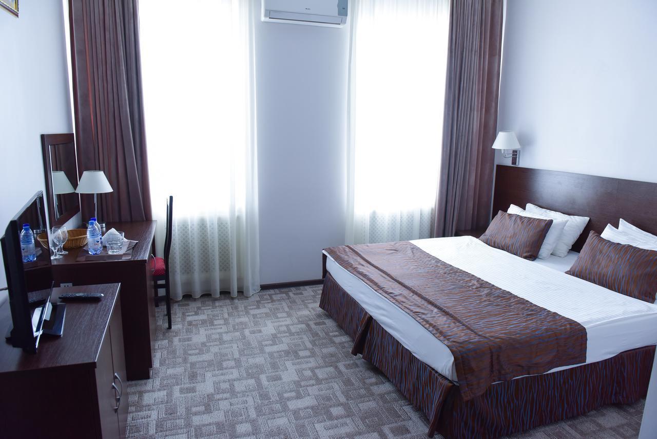 Tanzharyk Hotel アクトベ エクステリア 写真