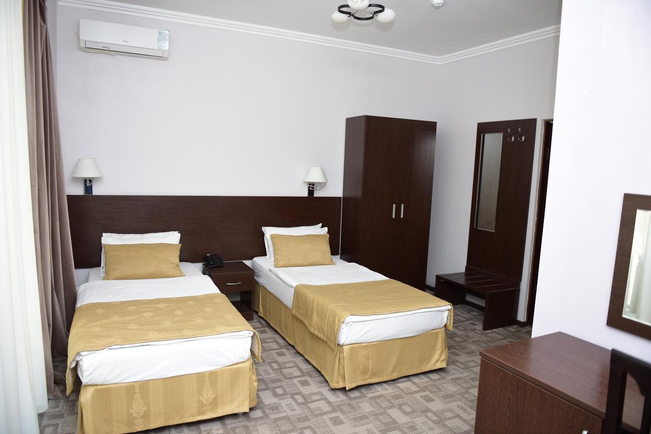 Tanzharyk Hotel アクトベ エクステリア 写真